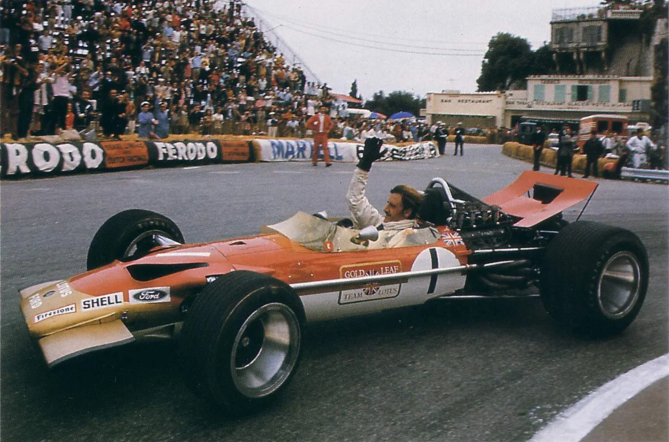 Graham Hill celebrates as he wins the 1969 Monaco Grand Prix - his 5th Monaco Grand Prix victory!